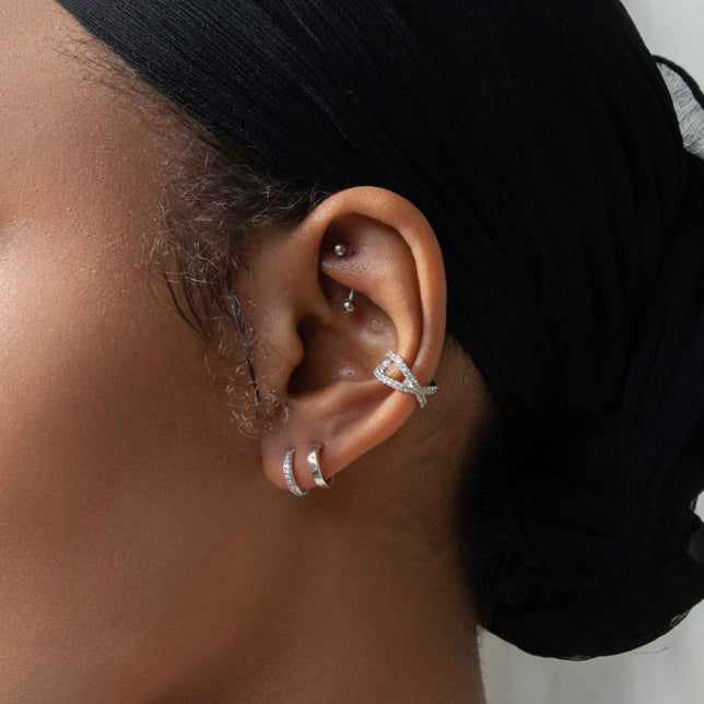 Illusion Stud Earrings in Silver worn with ear cuff