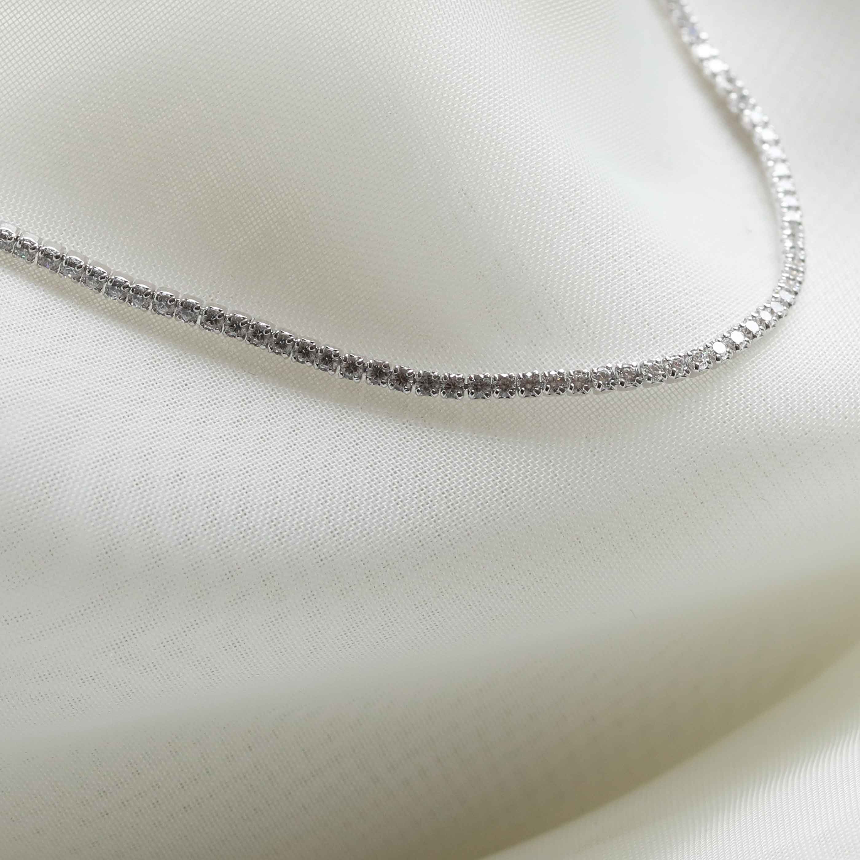 Flat lay shot of Tennis Chain Necklace in Silver
