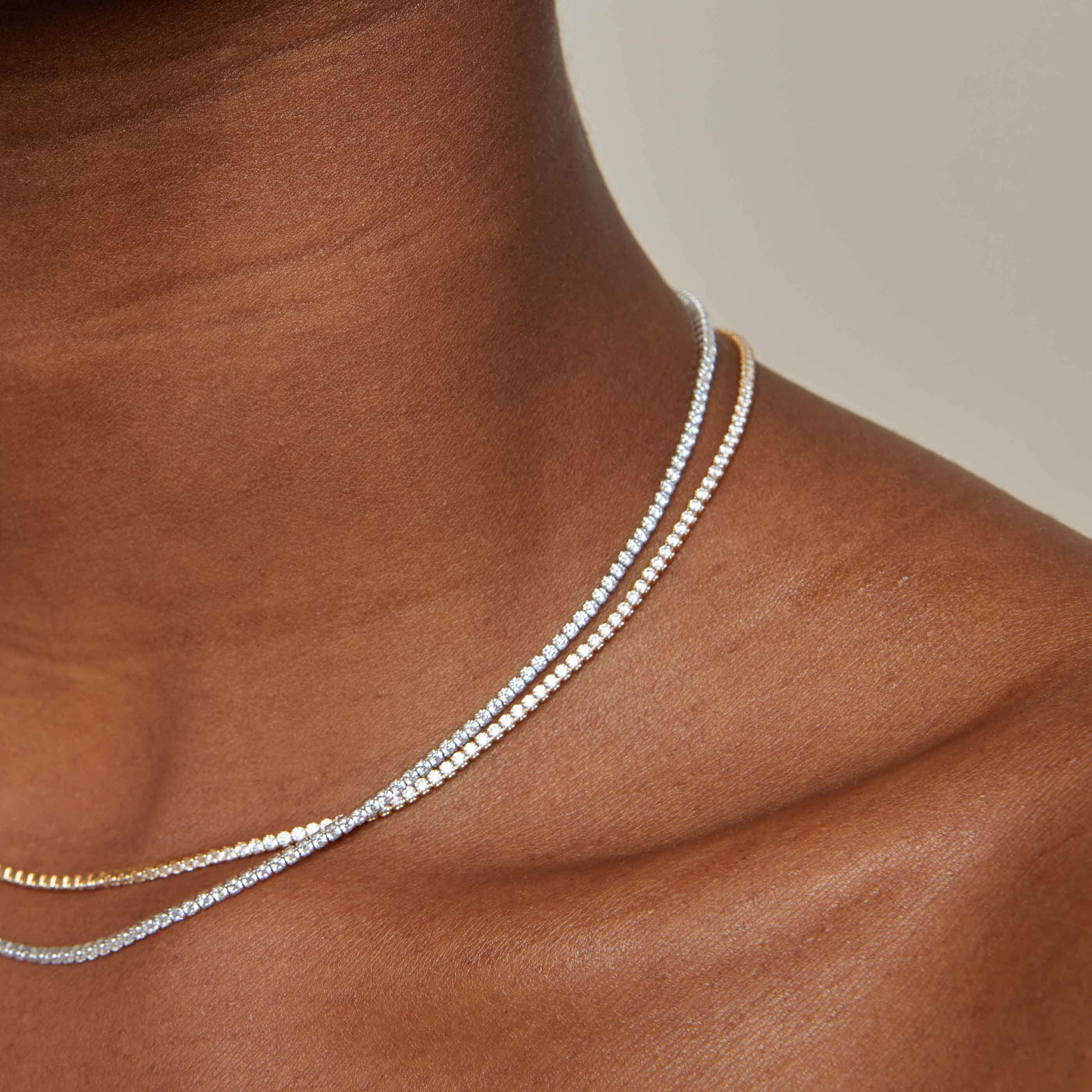 Tennis Chain Necklace in Silver layered with Tennis Chain Necklace in Gold
